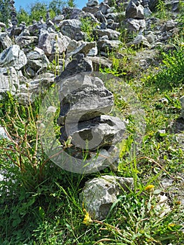 A marble pyramid built on the slope of the White Mountain to fulfill a wish in the Ruskeala Mountain Park on a sunny summer day