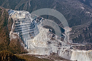 Marble quarry aerial view shot on drone. Industrial industrial development of terrestrial resources