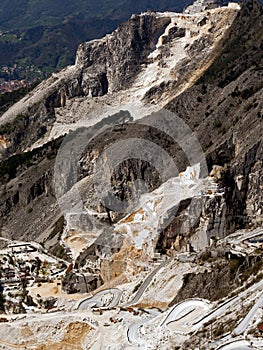 Marble quarry with hairpin bends mountain roads - Italy industry