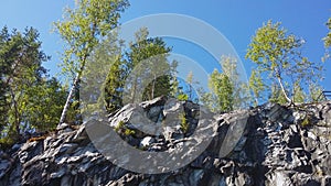 Marble quarry, marble rocks in the wild.