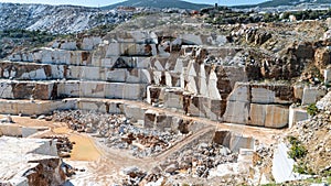 Marble quarry pit full of rocks and blocks in Marmara island, Turkey