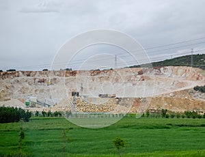 Marble quarry quarrying white marble in open pit