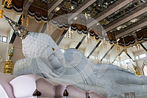 Marble of Reclining Buddha statue in Temple of watpaphukon, asia