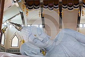 Marble of Reclining Buddha statue in Temple of watpaphukon.