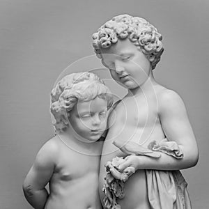 Marble sculpture of girl and boy