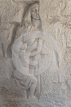 Marble sculpture of a woman nursing her baby. The legend of the Rozafa castle, Shkodra, Albania