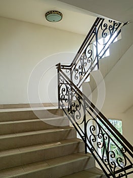 Marble staircase with stairs in luxury hall