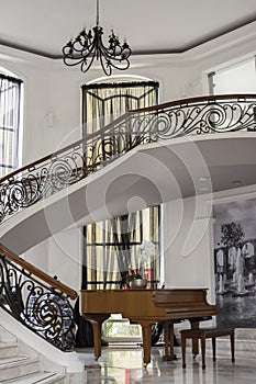 Marble Stairs With Wood and Steel Decoration and a Piano