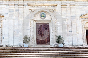 Marble stairs and wooden door of cathedral