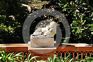 Marble statue in a fountain of a garden in Lisbon