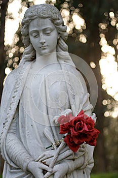 Marble Statue Holding Roses