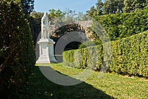 Marble statue at Horti Leoni public garden in San Quirico d`Orcia , Siena province, Tuscany