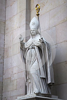 Marble statue of Saint Rupert in the facade of the Dome Cathedral in City Center of Salzburg, Austria