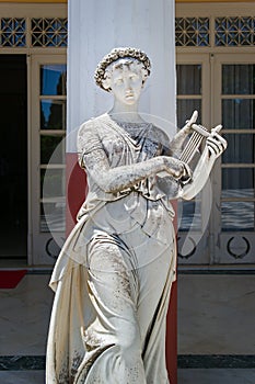 Marble statue of Terpsichore in the Courtyard of the Muses, Achilleion Palace, Corfu, Greece photo