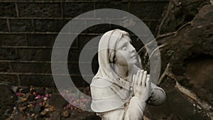 Marble statue of Virgin Mother Mary praying