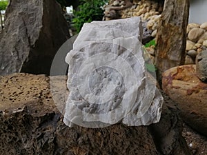 Marble stone on nature background.