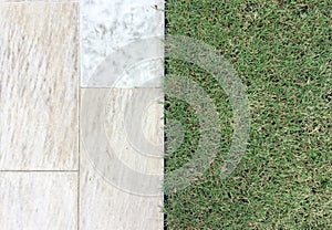 Marble Stone Pattern Sidewalk with Grasses in The Garden