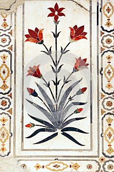 Marble surface is covered by stone inlay.