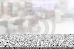 Marble table with library blur background