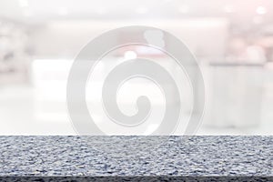 Marble table with register counter blurry background photo