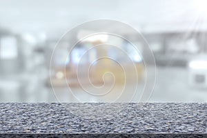 Marble table top with register counter blurry background