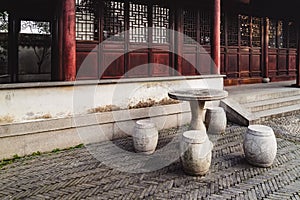 Marble tables and chairs at Humble Administrator`s Garden, Suzhou, Jiangsu province, China