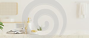 Marble tabletop with bathing accessories for display montage over blurred white bathroom