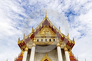 The marble temple roof or Wat Benchamabophit Dusitwanaram, Bangkok, Thailand is made entirely of marble. Decorated with colorful