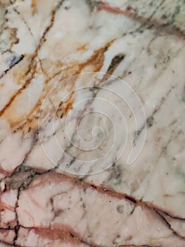 Marble tiles, smooth slabs, beautiful red-cream patterned surface, marble tiles for the background.