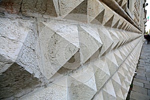 marble wall of the Palazzo dei Diamanti in Ferrara, Italy