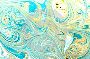 Marbled abstract background. Liquid marble pattern. Colorful marble backdrop. Golden glitter texture. Color, green.