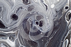 Marbled black and white abstract background. Liquid acrylic marble pattern