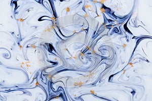 Marbled unique blue abstract background with gold dust