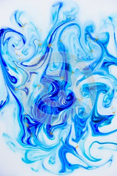 Marbled unique blue white and gold abstract background