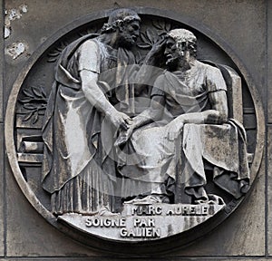 Marc Aurele heals by Galen. Stone relief at the building of the Faculte de Medicine Paris