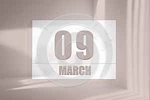 march 09. 09th day of the month, calendar date. White sheet of paper with numbers on minimalistic pink background with