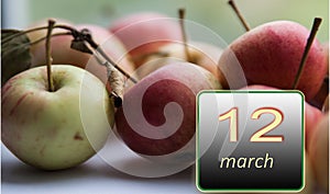 March 12 ,12th day of the month .Apples - vitamins you need every day. Spring month. Day of the year concept