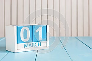 March 1st. Image of march 1 wooden color calendar on white background. First spring day, empty space for text