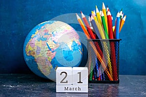 March 21 on the wooden calendar.The twenty-first day of the spring month, a calendar for the workplace. Spring