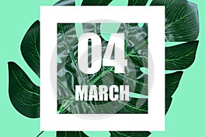 march 4th. Day 4 of month,Date text in white frame against tropical monstera leaf on green background spring month, day