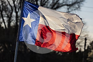 MARCH 6, 2018 - TEXAS STATE FLAG - Texas Lone Star flag stands out against a cloudless blue. Star, background