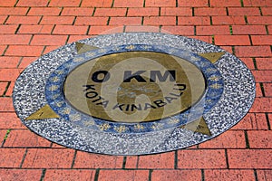 Memorial plaque with zero kilometers photo