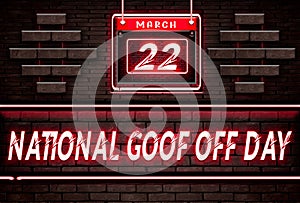 22 March, National Goof Off Day, Neon Text Effect on Bricks Background photo