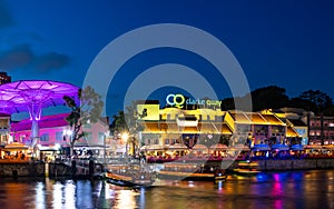 2019 March 1st, Singapore, Clarke Quay - City nightscape scenery of colorful the buildings along the river in the city