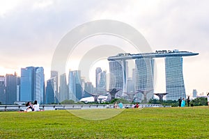 2019 March 1st, Singapore, Marina Barrage - Panorama view of the city buildings and people doing their activities at sunset