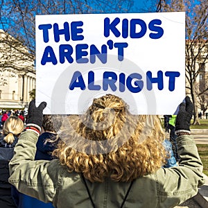 MARCH 24, 2018: Washington, D.C. hundreds of thousands protest against NRA on Pennsylvania Avenue. Douglas, sign