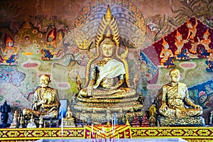 Big Gold buddha and gold monk status in buddhist temple and hist