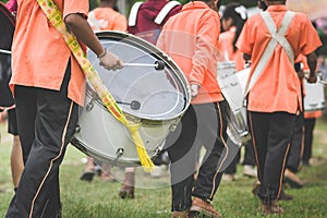 Marching band drummers perform in school