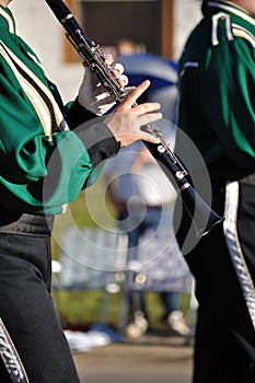 Marching Band Performer Playing Clarinet in Parade