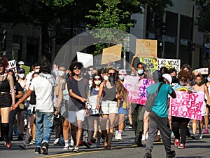 Marching on the Street in the Late Afternoon